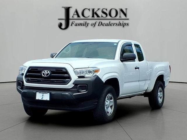 2016 Toyota Tacoma SR in White — front three-quarter view